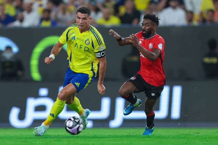 RIYADH, SAUDI ARABIA - AUGUST 22: Cristiano Ronaldo of Al Nassr during the Saudi Pro League match between Al Nassr and Al Raed at Al Awwal Park Stadium on August 22, 2024 in Riyadh, Saudi Arabia. (Photo by Yasser Bakhsh/Getty Images)