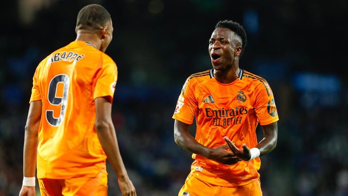 SAN SEBASTIAN, SPAIN - SEPTEMBER 14: Kylian Mbappe and Vinicius Junior of Real Madrid celebrates a goal during the Spanish league, La Liga EA Sports, football match played between Real Sociedad and Real Madrid at Anoeta stadium on September 14, 2024, in San Sebastian, Spain. (Photo By Irina R. Hipolito/Europa Press via Getty Images)