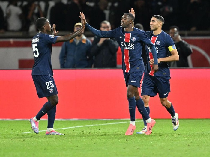 PARIS, FRANCE -SEPTEMBER 14: Ousmane Dembele (C) of Paris Saint - Germain celebrates after a score during the French Ligue 1 (L1) soccer match between Paris Saint-Germain (PSG) and Brest at Parc des Princes stadium in Paris, France on September 14, 2024. (Photo by Mustafa Yalcin/Anadolu via Getty Images)