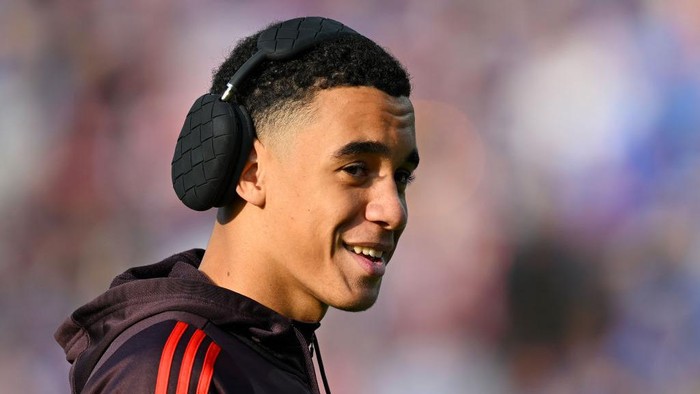 Jamal Musiala KIEL, GERMANY - SEPTEMBER 14: Jamal Musiala of Bayern Munich looks on prior to the Bundesliga match between Holstein Kiel and FC Bayern München at Holstein-Stadion on September 14, 2024 in Kiel, Germany. (Photo by Stuart Franklin/Getty Images)