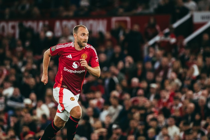 MANCHESTER, ENGLAND - SEPTEMBER 17: Christian Eriksen of Manchester United in action during the Carabao Cup Third Round match between Manchester United and Barnsley at Old Trafford on September 17, 2024 in Manchester, England. (Photo by Ash Donelon/Manchester United via Getty Images)