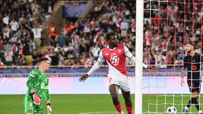 MONACO, MONACO - SEPTEMBER 19: George Ilenikhena of AS Monaco celebrates 2nd goal during the UEFA Champions League 2024/25 League Phase MD1 match between AS Monaco and FC Barcelona at Stade Louis II on September 19, 2024 in Monaco, Monaco. (Photo by Neal Simpson/Allstar/Getty Images)