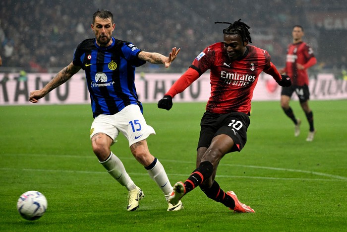 Francesco Acerbi of FC Internazionale and Rafael Leao of AC Milan during the Serie A football match between AC Milan and FC Internazionale at San Siro stadium. Milan (Italy), April 22nd, 2024.  (Photo by Elianton/Mondadori Portfolio via Getty Images)