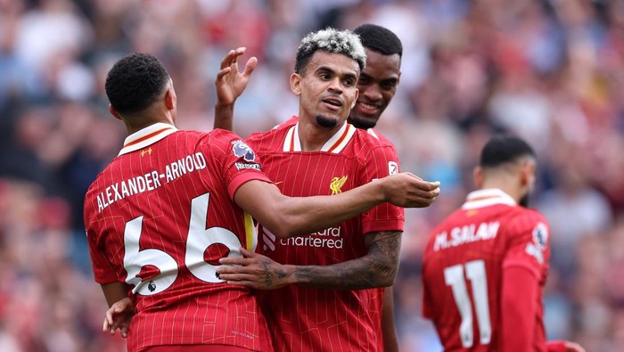 LIVERPOOL, ENGLAND - SEPTEMBER 21: Luis Diaz of Liverpool celebrates with Trent Alexander-Arnold after scoring his teams second goal during the Premier League match between Liverpool FC and AFC Bournemouth at Anfield on September 21, 2024 in Liverpool, England. (Photo by Alex Livesey/Getty Images)