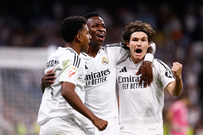MADRID, SPAIN - SEPTEMBER 21: Rodrygo Goes, Vinicius Junior and Fran Garcia of Real Madrid celebrate a goal during the Spanish League, LaLiga EA Sports, football match played between Real Madrid and RCD Espanyol at Santiago Bernabeu stadium on September 21, 2024, in Madrid, Spain. (Photo By Dennis Agyeman/Europa Press via Getty Images)