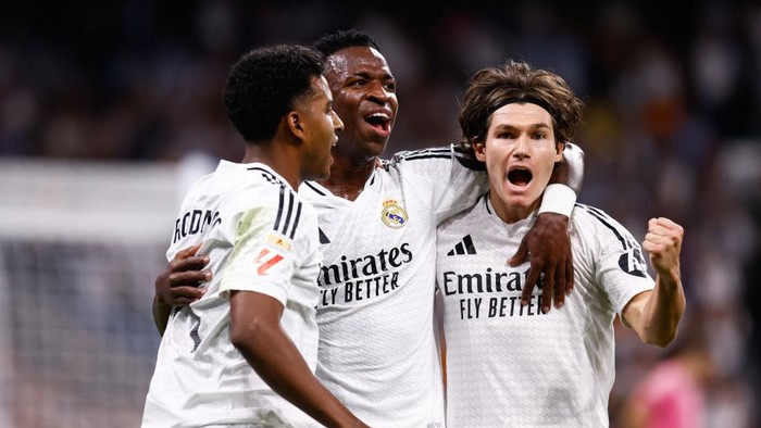 MADRID, SPAIN - SEPTEMBER 21: Rodrygo Goes, Vinicius Junior and Fran Garcia of Real Madrid celebrate a goal during the Spanish League, LaLiga EA Sports, football match played between Real Madrid and RCD Espanyol at Santiago Bernabeu stadium on September 21, 2024, in Madrid, Spain. (Photo By Dennis Agyeman/Europa Press via Getty Images)