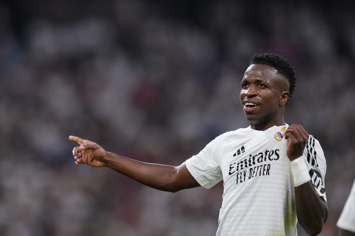 Vinicius Junior Real Madrids Vinicius Junior, left, celebrates after he scored his teams third goal against Espanyol during a Spanish La Liga soccer match at Santiago Bernabeu stadium in Madrid, Spain, Saturday, Sept. 21, 2024. (AP Photo/Manu Fernandez)