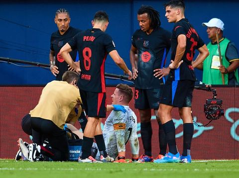 VILLARREAL, SPAIN - SEPTEMBER 22: Marc-Andre Ter Stegen of Barcelona lies injured on the pitch during the LaLiga match between Villarreal CF and FC Barcelona  at Estadio de la Ceramica on September 22, 2024 in Villarreal, Spain. (Photo by Omar Arnau/Quality Sport Images/Getty Images)