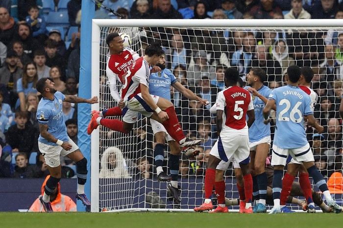 Gabriel Magalhaes Soccer Football - Premier League - Manchester City v Arsenal - Etihad Stadium, Manchester, Britain - September 22, 2024 Arsenal's Gabriel Magalhaes celebrates scoring their second goal Action Images via Reuters/Jason Cairnduff EDITORIAL USE ONLY. NO USE WITH UNAUTHORIZED AUDIO, VIDEO, DATA, FIXTURE LISTS, CLUB/LEAGUE LOGOS OR 'LIVE' SERVICES. ONLINE IN-MATCH USE LIMITED TO 120 IMAGES, NO VIDEO EMULATION. NO USE IN BETTING, GAMES OR SINGLE CLUB/LEAGUE/PLAYER PUBLICATIONS. PLEASE CONTACT YOUR ACCOUNT REPRESENTATIVE FOR FURTHER DETAILS..