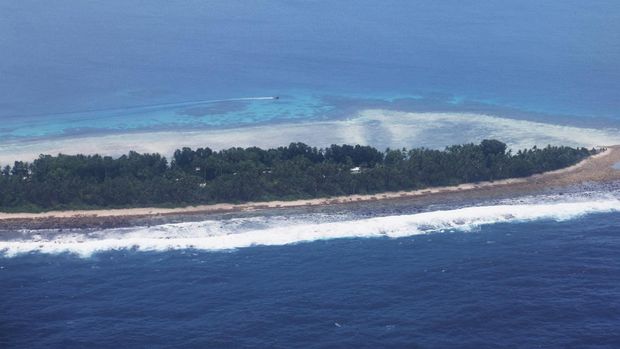 Aerial view of Funafuti, Tuvalu's most populous island, showing the port and main town of Fongafale, September 6, 2024. Picture taken through plane window. REUTERS/Kirsty Needham