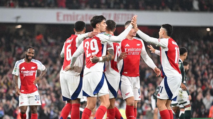 LONDON, ENGLAND - SEPTEMBER 25: Kai Havertz of Arsenal celebrates scoring his team's fifth goal with teammate Gabriel Martinelli during the Carabao Cup Third Round match between Arsenal and Bolton Wanderers at Emirates Stadium on September 25, 2024 in London, England. (Photo by Stuart MacFarlane/Arsenal FC via Getty Images)