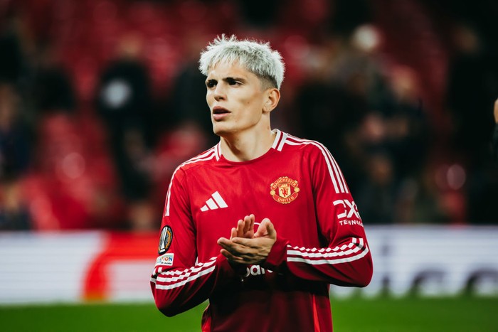 MANCHESTER, ENGLAND - SEPTEMBER 25:   Alejandro Garnacho of Manchester United applauds the fans at the end of the UEFA Europa League 2024/25 League Phase MD1 match between Manchester United and FC Twente at Old Trafford on September 25, 2024 in Manchester, England. (Photo by Ash Donelon/Manchester United via Getty Images)