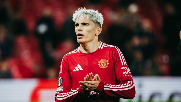 MANCHESTER, ENGLAND - SEPTEMBER 25:   Alejandro Garnacho of Manchester United applauds the fans at the end of the UEFA Europa League 2024/25 League Phase MD1 match between Manchester United and FC Twente at Old Trafford on September 25, 2024 in Manchester, England. (Photo by Ash Donelon/Manchester United via Getty Images)