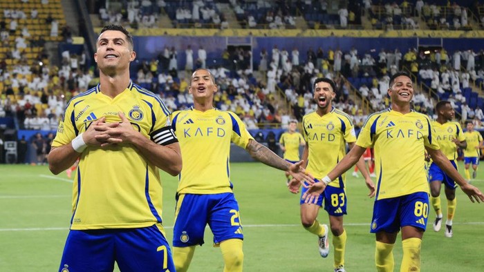 RIYADH, SAUDI ARABIA - SEPTEMBER 27: Cristiano Ronaldo of Al-Nassr celebrates scoring his sides second goal during the Saudi Pro League match between Al Nassr FC v Al-Wehda FC at Al-Awwal Stadium on September 27, 2024 in Riyadh, Saudi Arabia. (Photo by Al Nassr FC/Al Nassr FC via Getty Images)