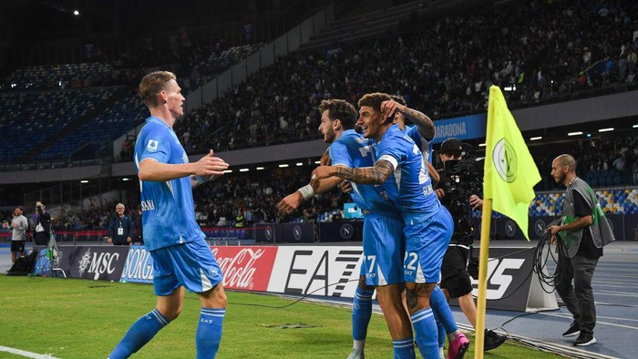 Diego Armando Maradona Stadium, Napoli, ITALY - SEP 29 2024: SSC Napoli player Khvicha Kvaratskhelia celebrating his goal with the team during the Serie A match between SSC Napoli and AC Monza at Diego Armando Maradona Stadium on September 29, 2024 in Napoli, Italy. (Photo by SSC Napoli/Getty Images)