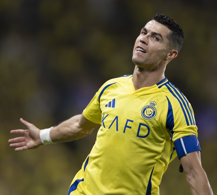 2175045627 RIYADH, SAUDI ARABIA - SEPTEMBER 30: Cristiano Ronaldo of Al-Nassr celebrates after scoring a goal during the AFC Champions League group B match between Al-Nassr and Al-Rayyan at Alawwal Park Stadium in Riyadh, Saudi Arabia on September 30, 2024. (Photo by Mohammed Dabbous/Anadolu via Getty Images)
