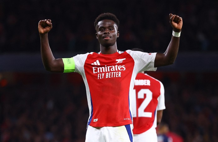 Soccer Football - Champions League - Arsenal v Paris St Germain - Emirates Stadium, London, Britain - October 1, 2024 Arsenals Bukayo Saka celebrates scoring their second goal REUTERS/Hannah Mckay