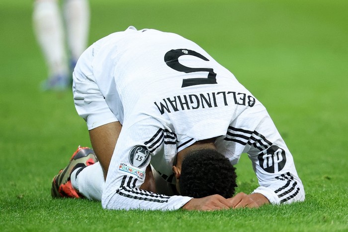 Real Madrids English midfielder #05 Jude Bellingham reacts during the UEFA Champions League football match between Lille LOSC and Real Madrid at the Pierre Mauroy Stadium in Villeneuve-dAscq, northern France, on October 2, 2024. (Photo by FRANCK FIFE / AFP)