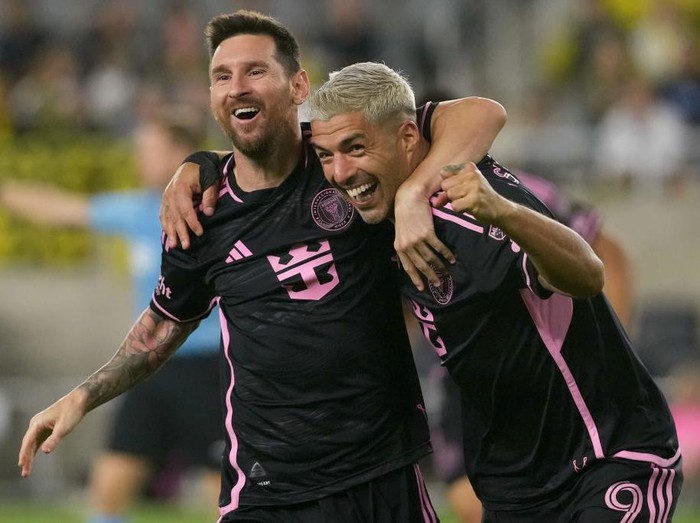 COLUMBUS, OHIO - OCTOBER 02: Lionel Messi #10 and Luis Suarez #9 of Inter Miami CF celebrate a goal during the second half against the Columbus Crew at Lower.com Field on October 02, 2024 in Columbus, Ohio. (Photo by Jason Mowry/Getty Images)