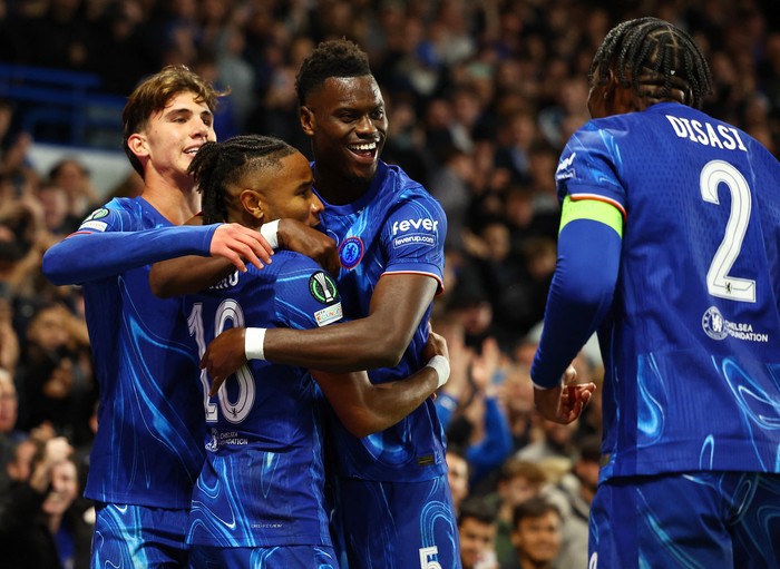 Soccer Football - Europa Conference League - Chelsea v Gent - Stamford Bridge, London, Britain - October 3, 2024 Chelsea's Christopher Nkunku celebrates scoring their third goal with Chelsea's Benoit Badiashile, Chelsea's Cesare Casadei and Chelsea's Axel Disasi Action Images via Reuters/Andrew Boyers