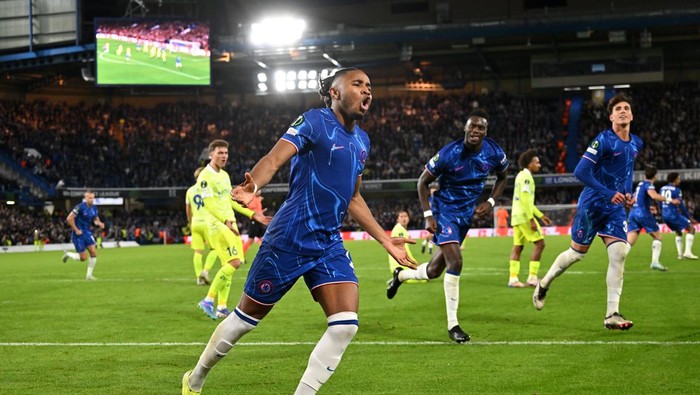 LONDON, ENGLAND - OCTOBER 03: Christopher Nkunku of Chelsea celebrates scoring his teams third goal during the UEFA Conference League 2024/25 League Phase MD1 match between Chelsea FC and KAA Gent at Stamford Bridge on October 03, 2024 in London, England. (Photo by Mike Hewitt/Getty Images)