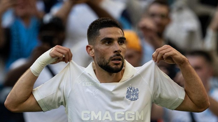 Marseilles French-Argentinian forward #32 Neal Maupay celebrates after scoring a goal during the French L1 football match between Olympique de Marseille (OM) and OGC Nice at Stade Velodrome in Marseille, southern France on September 14, 2024. (Photo by MIGUEL MEDINA / AFP) / The erroneous mention[s] appearing in the metadata of this photo by MIGUEL MEDINA has been modified in AFP systems in the following manner:[Marseilles French-Argentinian forward #32 Neal Maupay] instead of [Marseilles Moroccan midfielder #08 Azzedine Ounahi ]. Please immediately remove the erroneous mention[s] from all your online services and delete it (them) from your servers. If you have been authorized by AFP to distribute it (them) to third parties, please ensure that the same actions are carried out by them. Failure to promptly comply with these instructions will entail liability on your part for any continued or post notification usage. Therefore we thank you very much for all your attention and prompt action. We are sorry for the inconvenience this notification may cause and remain at your disposal for any further information you may require.