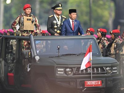 Potret Jokowi Hadiri Acara HUT TNI di Monas