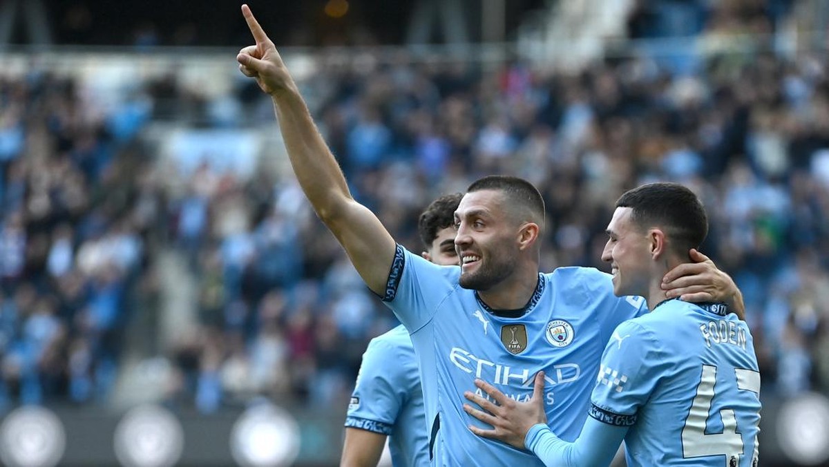 Mateo Kovacic merayakan gol ke gawang Fulham. (Foto: Gareth Copley/Getty Images)