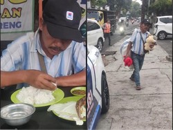 Mulia! Polisi Ini Traktir Makan Penjual Boneka yang Dagangannya Belum Laku