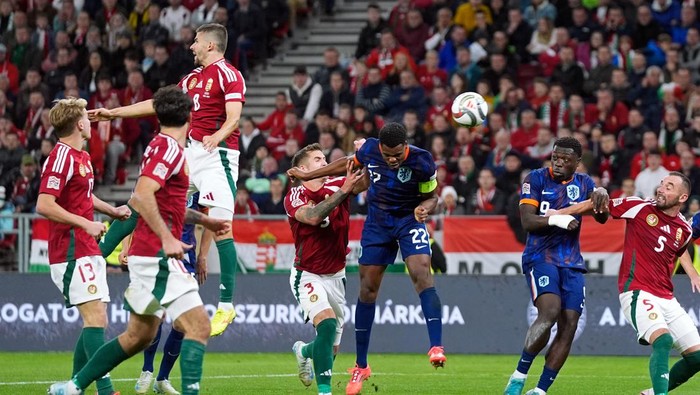 BUDAPEST, HUNGARY - OCTOBER 11: Denzel Dumfries of Holland scores the second goal to make it 1-1 during the  UEFA Nations league match between Hungary  v Holland at the Puskas Arena on October 11, 2024 in Budapest Hungary (Photo by Roy Lazet/Soccrates/Getty Images)