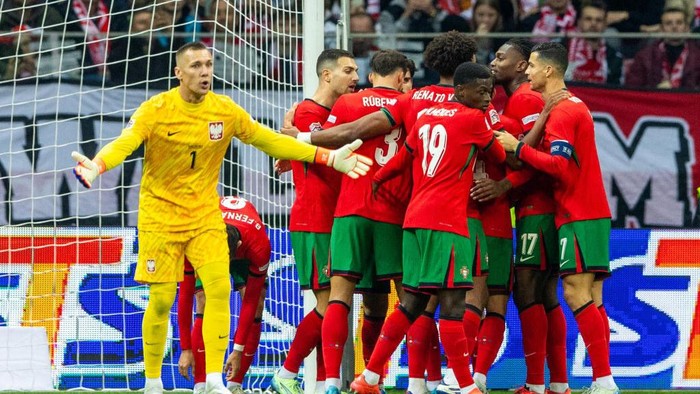 The Portugal national team celebrates after scoring a goal during the UEFA Nations League 2024 Group A A1 match between Poland and Portugal at the PGE Narodowe in Warsaw, Poland, 12 October 2024. (Photo by Andrzej Iwanczuk/NurPhoto via Getty Images)