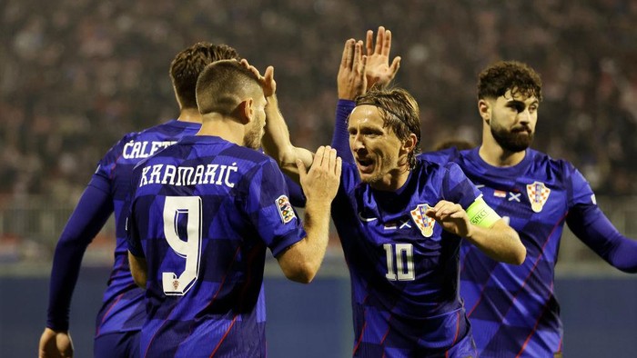 ZAGREB, CROATIA - OCTOBER 12: Andrej Kramaric of Croatia celebrates scoring his teams second goal with teammate Luka Modric during the UEFA Nations League 2024/25 League A Group A1 match between Croatia and Scotland at Stadion Maksimir on October 12, 2024 in Zagreb, Croatia. (Photo by Srdjan Stevanovic/Getty Images)