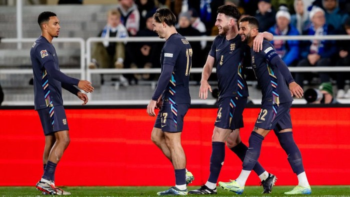 HELSINKI, FINLAND - OCTOBER 13: Declan Rice of England celebrates 0-3 with Jack Grealish of England Kyle Walker of England Trent Alexander Arnold of England  during the  UEFA Nations league match between Finland  v England at the Helsinki Olympic Stadium on October 13, 2024 in Helsinki Finland (Photo by Jussi Eskola/Soccrates/Getty Images)