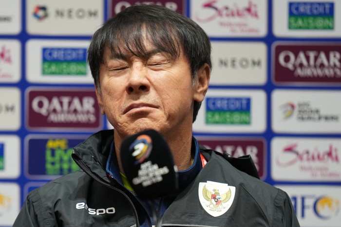 QINGDAO, CHINA - OCTOBER 14: Head coach Shin Tae-Yong of Indonesia attends a press conference before the FIFA World Cup Qualifier match between China and Indonesia at Qingdao Youth Football Stadium on October 14, 2024 in Qingdao, China.  (Photo by Fred Lee/Getty Images)