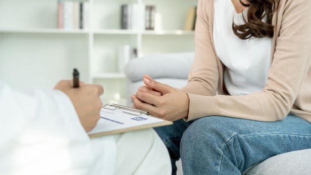 woman with mental health problems is consulting. psychiatrist is recording the patient's condition for treatment. encouragement, love and family problem, bipolar , depression patient, protect suicide