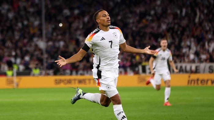 MUNICH, GERMANY - OCTOBER 14: Jamie Leweling of Germany celebrates scoring a goal, which was later ruled out by VAR during the UEFA Nations League 2024/25 League A Group A3 match between Germany and Netherlands at Allianz Arena on October 14, 2024 in Munich, Germany. (Photo by Maja Hitij/Getty Images for VW)