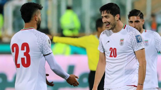 Timnas Iran Iran's forward #20 Sardar Azmoun celebrates scoring a goal during the 2026 FIFA World Cup AFC qualifiers football match between Iran and Hong Kong at the Azadi Stadium in Tehran on November 16, 2023. (Photo by AFP)