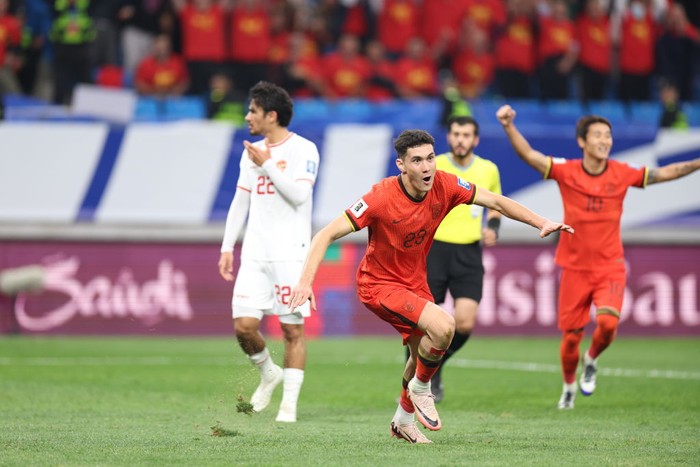 QINGDAO, CHINA - OCTOBER 15: Behram Abduweli #23 of China celebrates after scoring his teams first goal during the 2026 FIFA World Cup Qualifier fourth round Group C match between China and Indonesia at Qingdao Youth Football Stadium on October 15, 2024 in Qingdao, Shandong Province of China. (Photo by Yuan Meng/CFIDC/VCG via Getty Images)