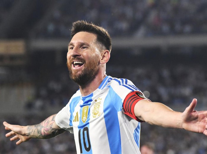 Lionel Messi celebrates his first goal of the night during a match between Argentina and Bolivia at Estadio Mas Monumental Antonio Vespucio Liberti in Buenos Aires, Argentina, on October 15. (Photo by Federico Peretti/NurPhoto via Getty Images)