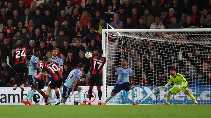 BOURNEMOUTH, ENGLAND - OCTOBER 19: Ryan Christie of AFC Bournemouth scores his teams first goal during the Premier League match between AFC Bournemouth and Arsenal FC at Vitality Stadium on October 19, 2024 in Bournemouth, England. (Photo by Michael Steele/Getty Images)