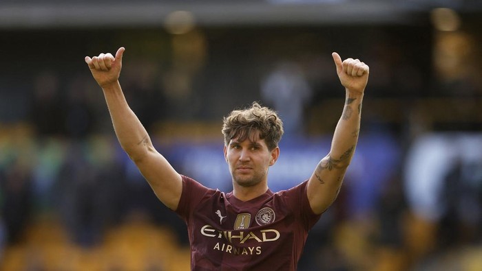 Soccer Football - Premier League - Wolverhampton Wanderers v Manchester City - Molineux Stadium, Wolverhampton, Britain - October 20, 2024 Manchester Citys John Stones celebrates after the match Action Images via Reuters/Jason Cairnduff EDITORIAL US