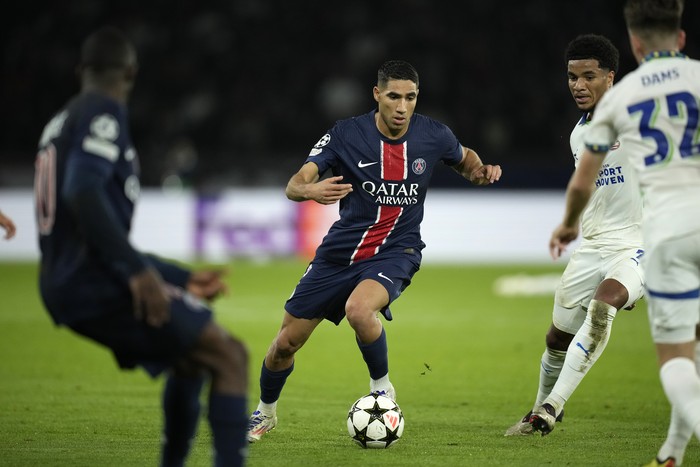 Achraf Hakimi PSG's Achraf Hakimi dribbles during the Champions League opening phase soccer match between Paris Saint-Germain and PSV Eindhoven at the Parc des Princes stadium in Paris, France, Tuesday, Oct. 22, 2024. (AP Photo/Christophe Ena)