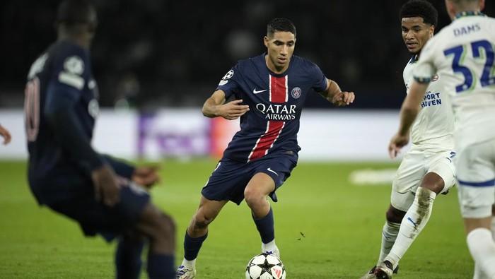 Achraf Hakimi PSGs Achraf Hakimi dribbles during the Champions League opening phase soccer match between Paris Saint-Germain and PSV Eindhoven at the Parc des Princes stadium in Paris, France, Tuesday, Oct. 22, 2024. (AP Photo/Christophe Ena)