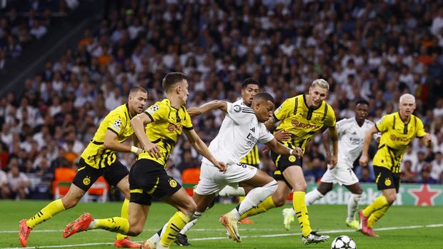 Soccer Football - Champions League - Real Madrid v Borussia Dortmund - Santiago Bernabeu, Madrid, Spain - October 22, 2024 Real Madrid's Kylian Mbappe in action before Vinicius Junior scores their second goal REUTERS/Susana Vera