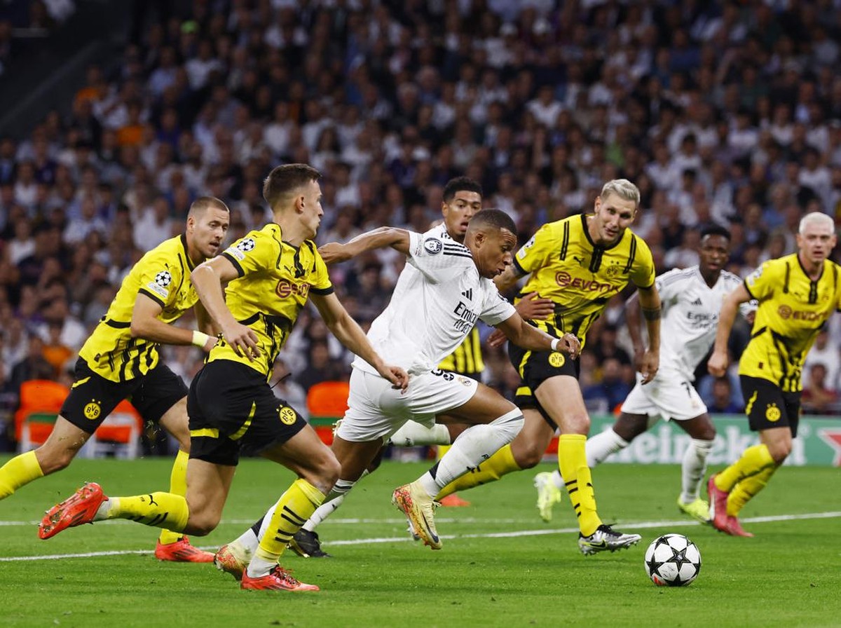 Borussia Dortmund memperpanjang rekor buruk di kandang Real Madrid. (Foto: REUTERS/Susana Vera)