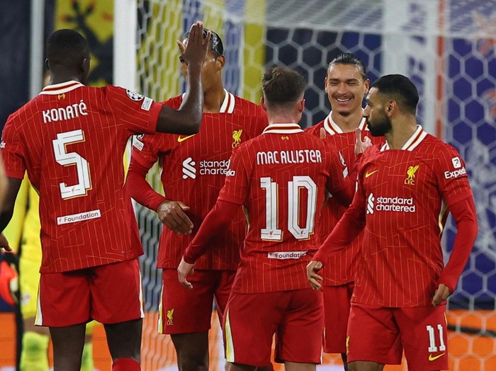 Soccer Football - Champions League - RB Leipzig v Liverpool - Red Bull Arena, Leipzig, Germany - October 23, 2024 Liverpool's Darwin Nunez celebrates scoring their first goal with Alexis Mac Allister REUTERS/Lisi Niesner