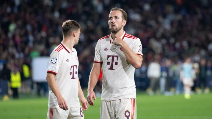 23 October 2024, Spain, Barcelona: Soccer: Champions League, FC Barcelona - Bayern Munich, preliminary round, matchday 3 at Estadi Olimpic Lluis Companys. Joshua Kimmich (l) and Harry Kane of Munich after the match. Photo: Sven Hoppe/dpa (Photo by Sven Hoppe/picture alliance via Getty Images)