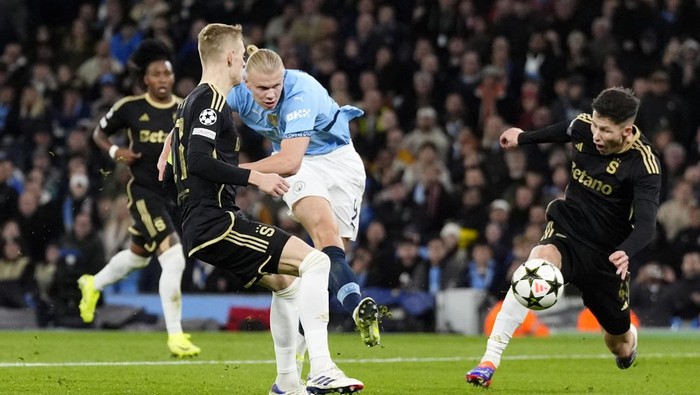 Manchester Citys Erling Haaland (centre rear) scores his sides fourth goal of the game during the UEFA Champions League group stage match at the Etihad Stadium, Manchester. Picture date: Wednesday October 23, 2024. (Photo by Nick Potts/PA Images via Getty Images)