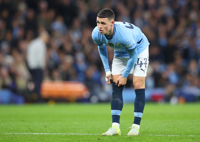 MANCHESTER, ENGLAND - OCTOBER 23: Phil Foden of Manchester City pulls up his socks during the UEFA Champions League 2024/25 League Phase MD3 match between Manchester City and AC Sparta Praha at City of Manchester Stadium on October 23, 2024 in Manchester, England. (Photo by Copa/Getty Images)
