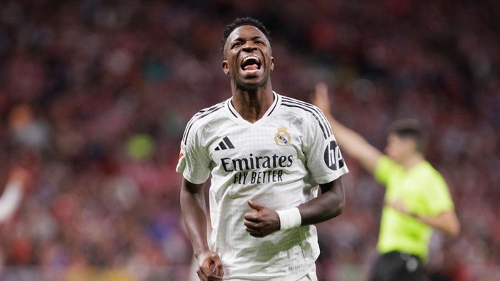 Vinicius Jr of Real Madrid reacts to a missed opportunity during the La Liga 2024/25 match between Atletico de Madrid and Real Madrid at Civitas Metropolitano Stadium in Madrid, Spain, on September 29, 2024. (Photo by Guillermo Martinez)
